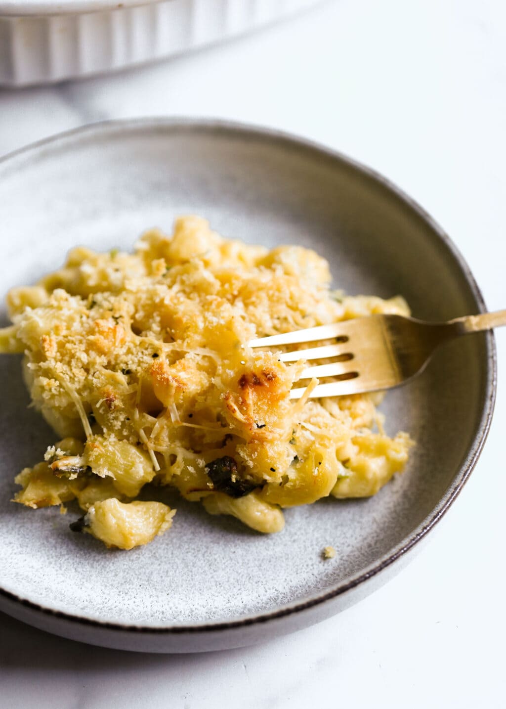 Mac and Cheese with Poblano Peppers in a gray bowl.