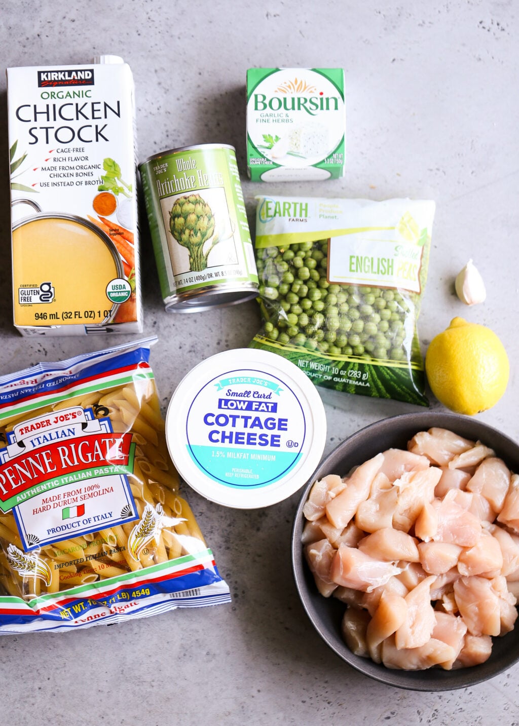 No-boil chicken pasta casserole: chicken, penne, artichokes, peas, cottage cheese, garlic, lemon, stock, and Boursin.