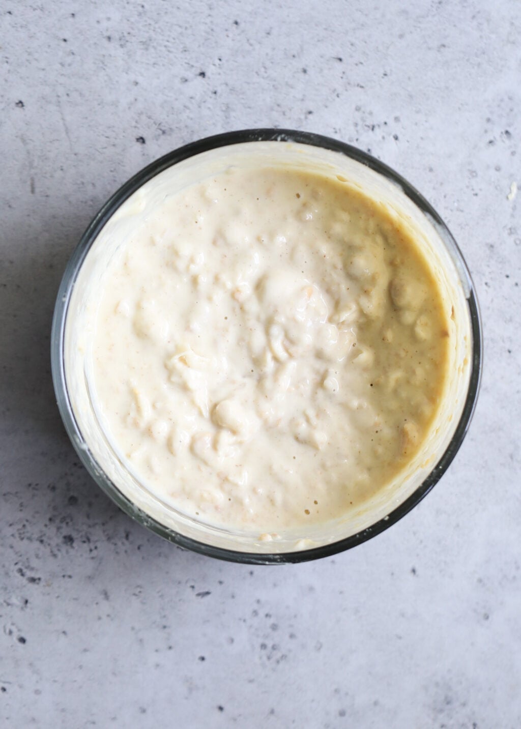 Creamy sauce for the Mediterranean Chicken Salad using lemon juice, Greek yogurt, garlic, dijon mustard and mashed chickpeas.
