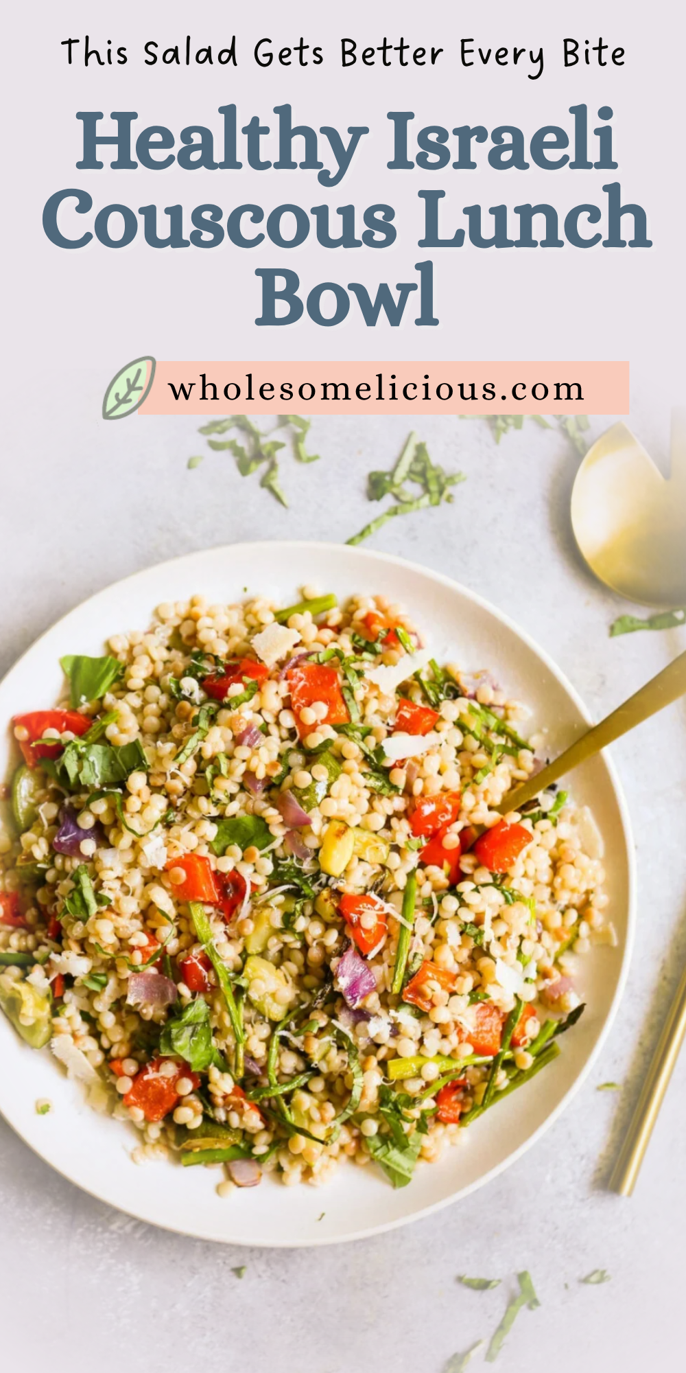 Israeli couscous salad with roasted vegetables, fresh herbs, and Parmesan served in a lunch bowl for a healthy Mediterranean‑style meal.