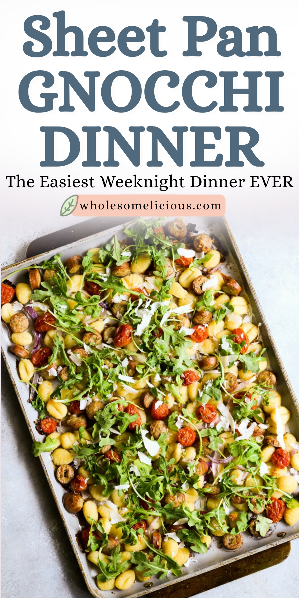 Sheet pan gnocchi with chicken sausage, tomatoes, red onion, arugula, and shaved cheese for an easy weeknight dinner.