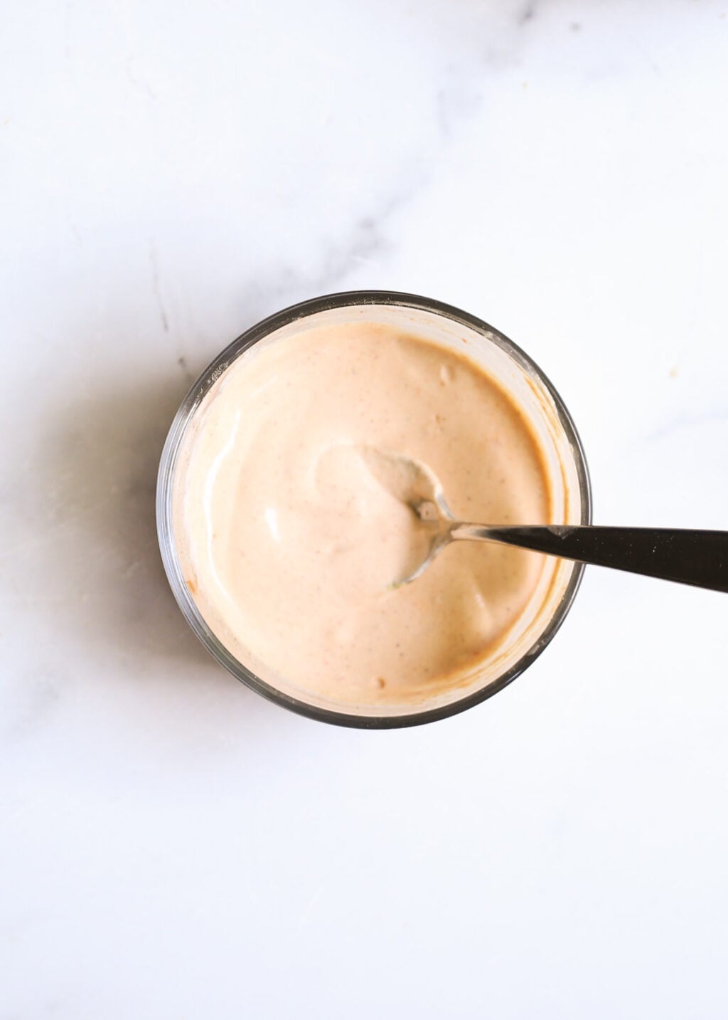 Homemade cottage cheese special sauce for healthy beef burger bowls.